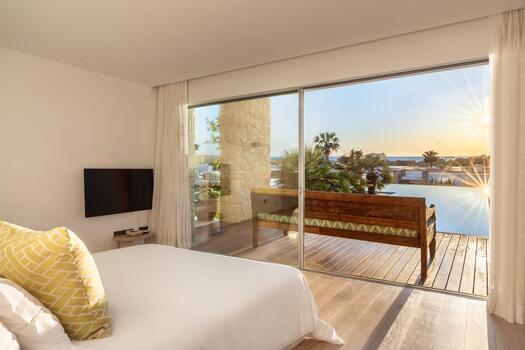 Bedroom with a terrace and ocean view