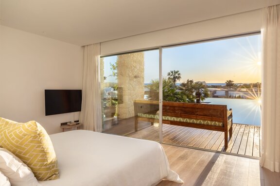 Bedroom with a terrace and ocean view