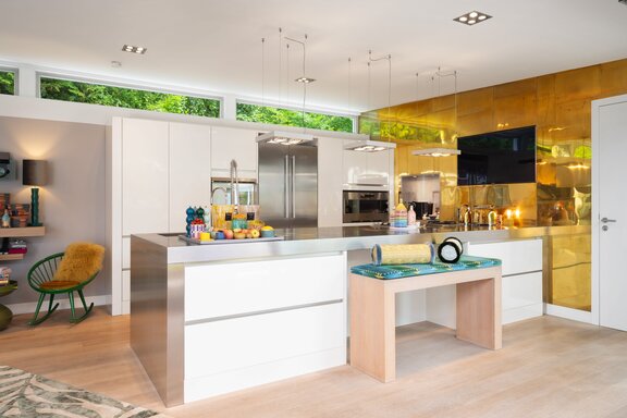 High-quality kitchen with a brass backsplash