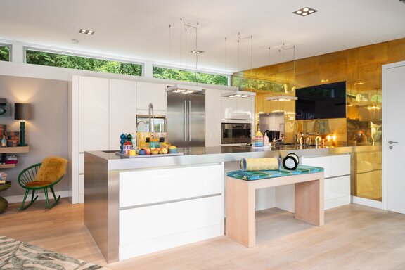 High-quality kitchen with a brass backsplash