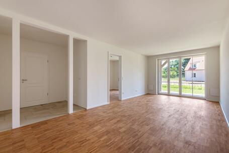 Zum Erstbezug: Sonnige Erdgeschosswohnung mit Südterrasse und Privatgarten