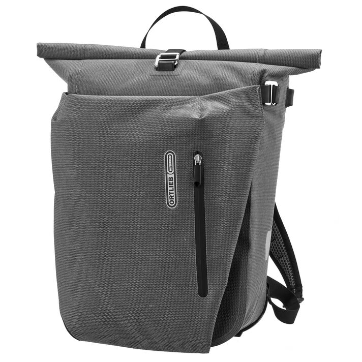 Cut-out black bike pannier with shoulder straps and a roll closure that can be worn as a backpack.