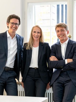 Markus Riedel, Martina Schumacher, Ron Than